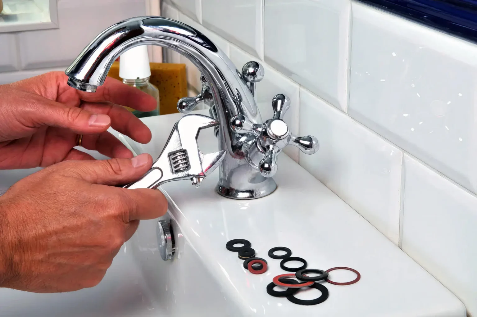 Plumber maintaining a bathroom faucet in Seal Beach