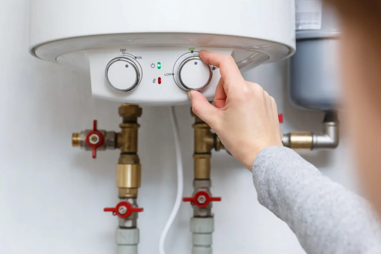 Technician adjusting a water heater in Seal Beach